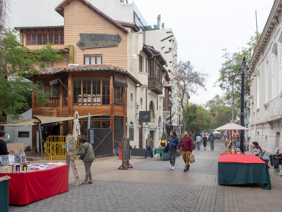 Book and craft stalls on pedestrianised Calle Lastarria