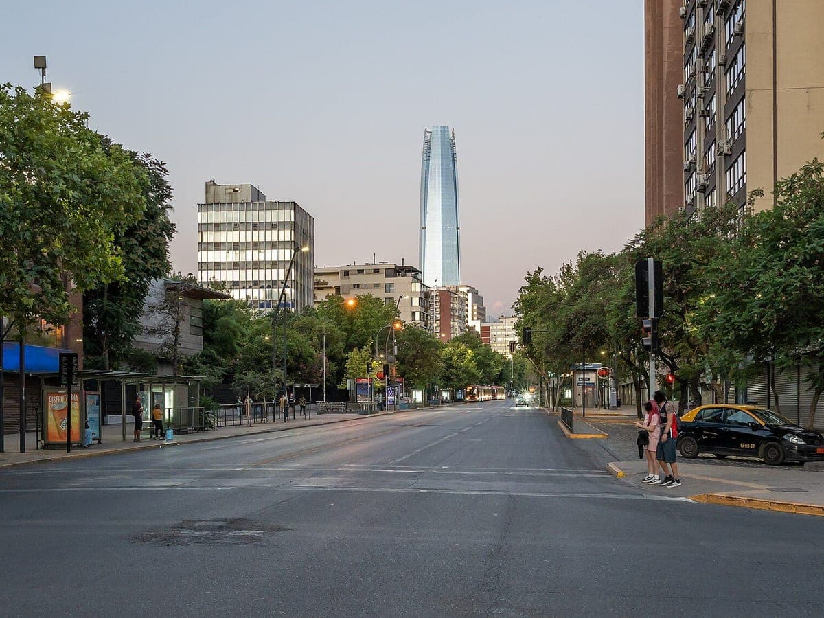 Avenida Providencia at dusk, running toward Gran Torre Costanera