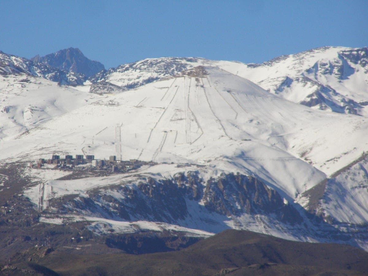El Colorado's ski runs above Farellones, with higher Andes peaks behind